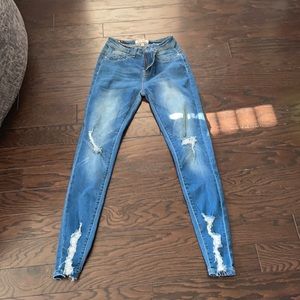 Blue skinny jeans brand new size 5 never worn.